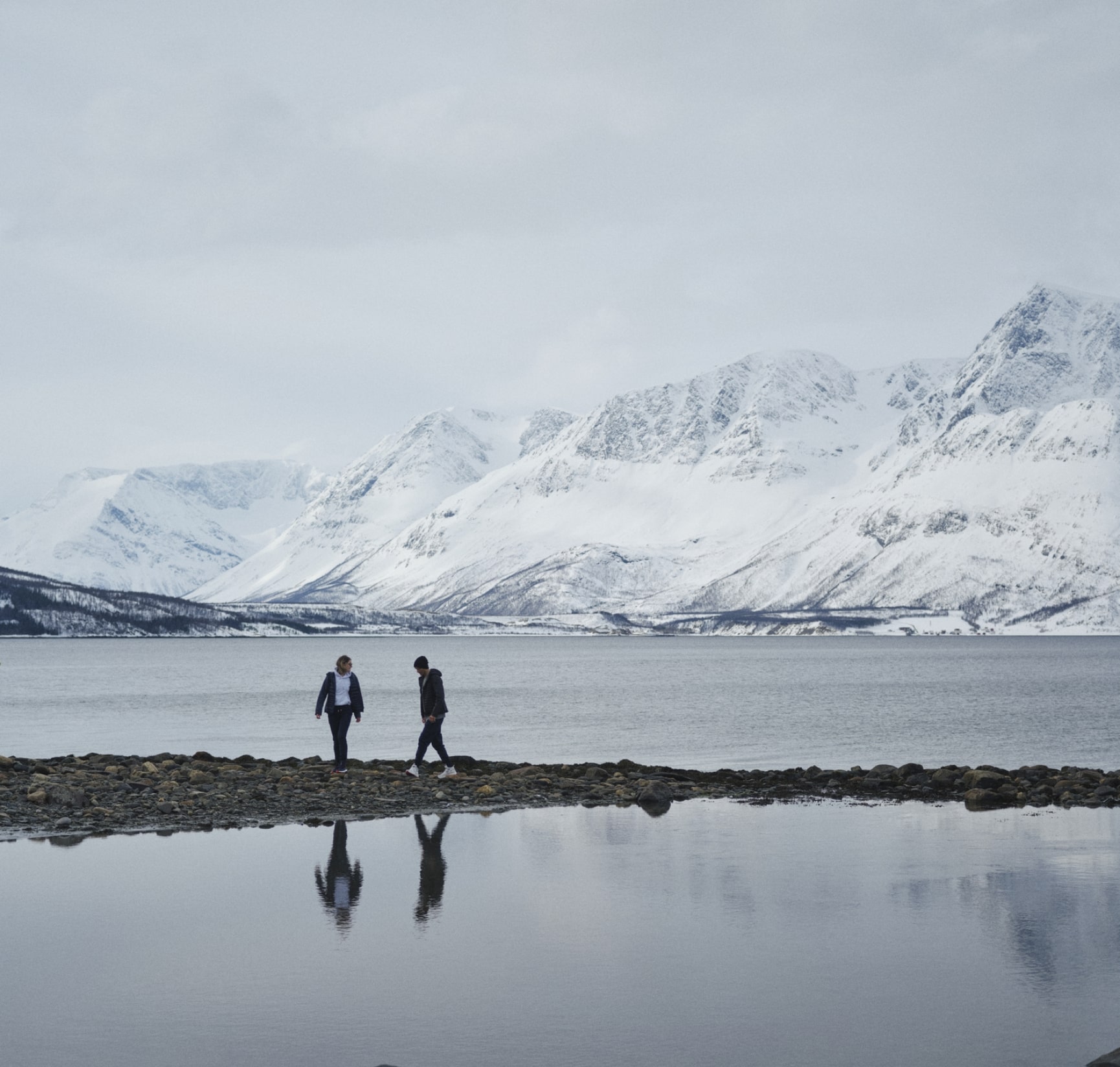 2 people next to an area of water