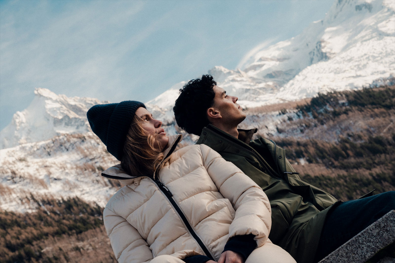 2 people wearing Rossignol down jackets